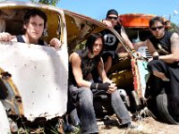 Bullet For My Valentine  Band photo in a burned out car.